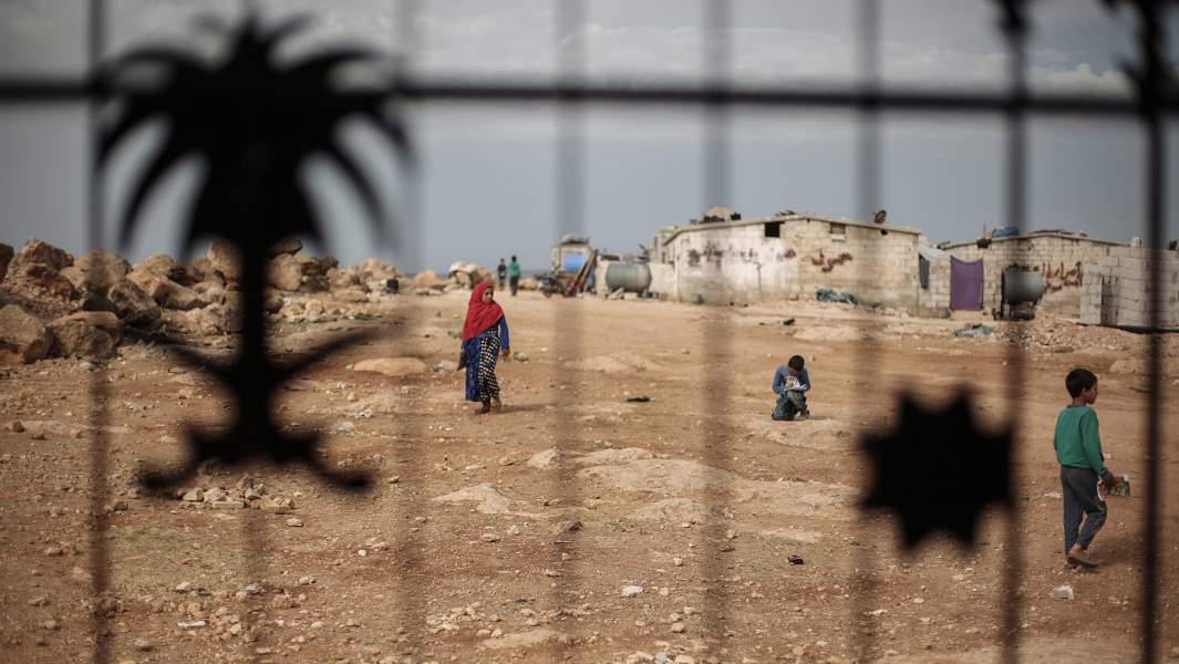 Syrian refugee children in the courtyard of a temporary school built in an old mosque in the eastern part of Idlib province