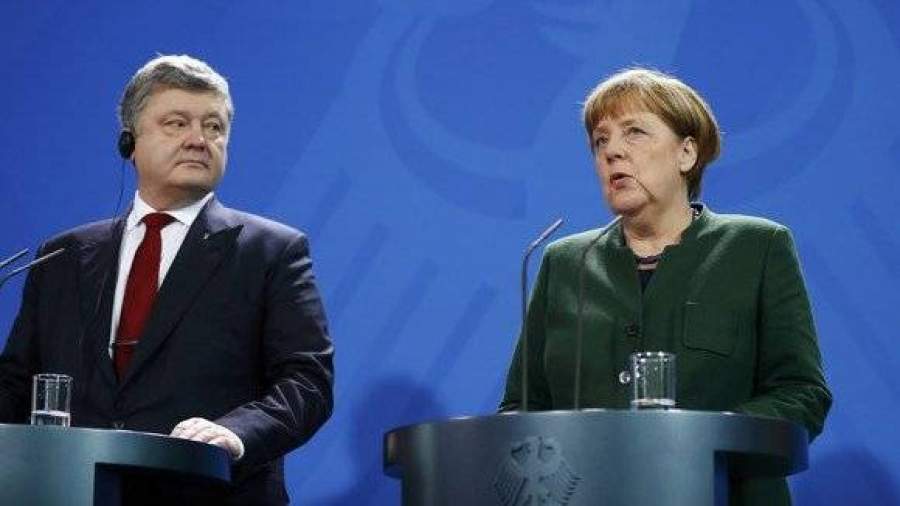 Порошенко прервал визит в Германию из-за обострения в Донбассе