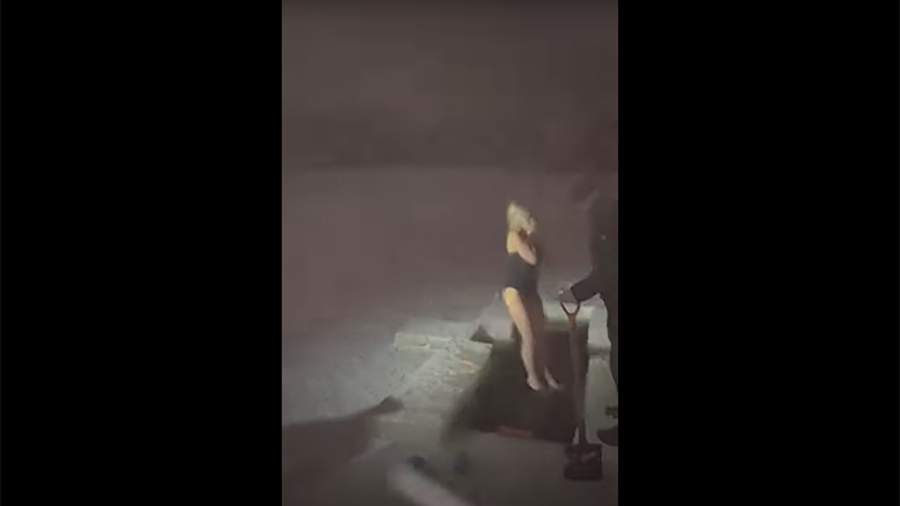 Woman Jumps In Ice Hole