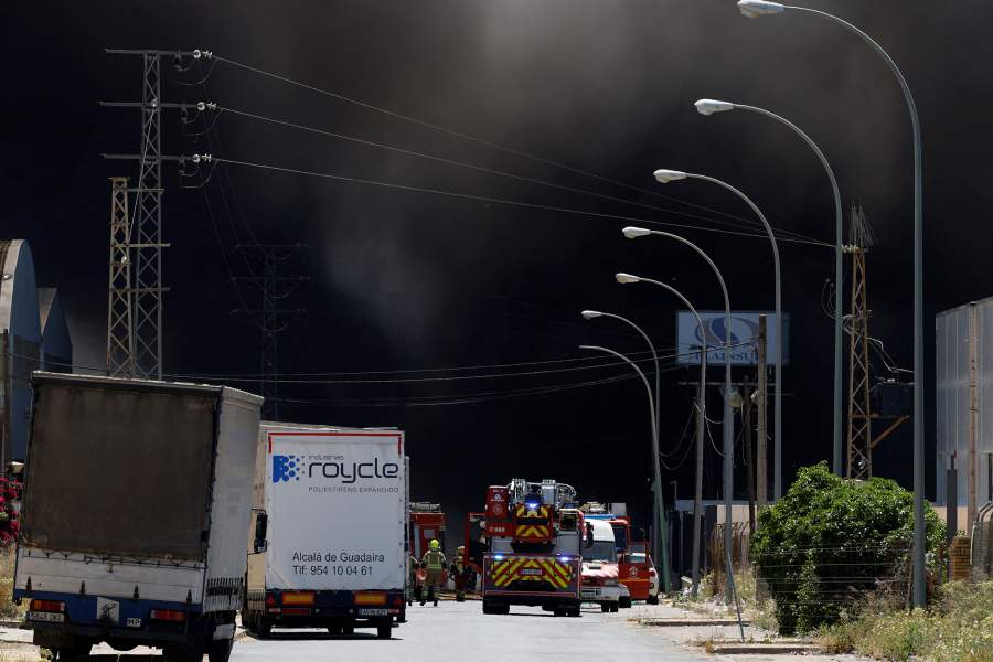 Smoke billows from a fire at a chemical plant in Seville, Spain May 14, 2025