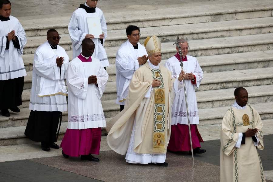 Pope Leo XIV walks during his inaugural Mass in Saint Peter’s Square, at the Vatican, May 18, 2025.