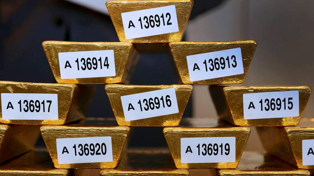 золото золотые слитки 