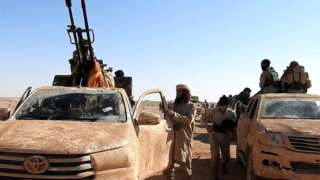 Боевики «Исламского государства» во время боев в Сирии