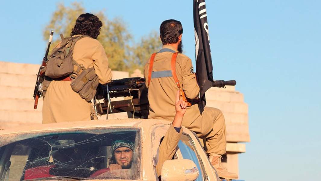 Боевики «Исламского государства» во время боев в Сирии