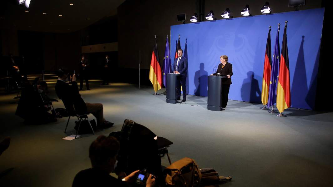 Йенс Шпан и Ангела Меркель