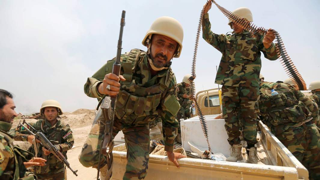 Бойцы шиитской военизированной группировки «Катаиб Сайид аль-Шухада»