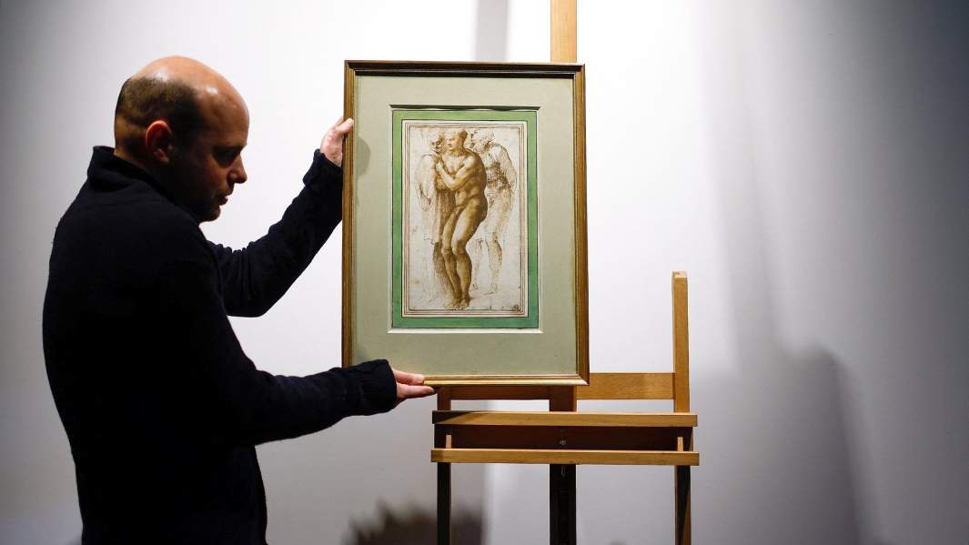 Рисунок Микеланджело «Обнаженный юноша (по мотивам Мазаччо) в окружении двух фигур»