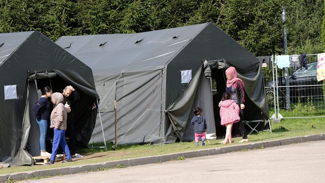 Лагерь мигрантов возле литовско-белорусской границы у деревни Мядининкай в Литве
