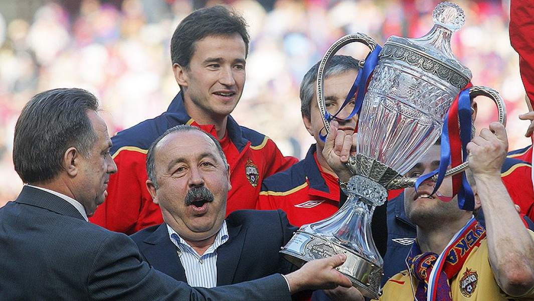 Виталий Мутко, Валерий Газзаев и Игорь Акинфеев после победы в финале Кубка России по футболу