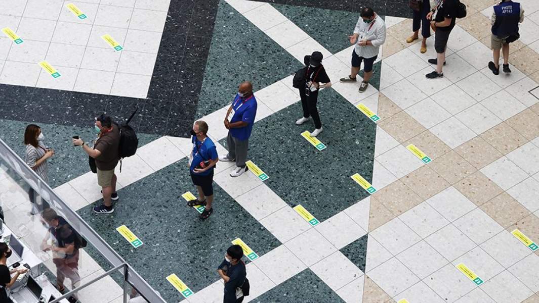 Журналисты в главном пресс-центре Олимпиады-2020