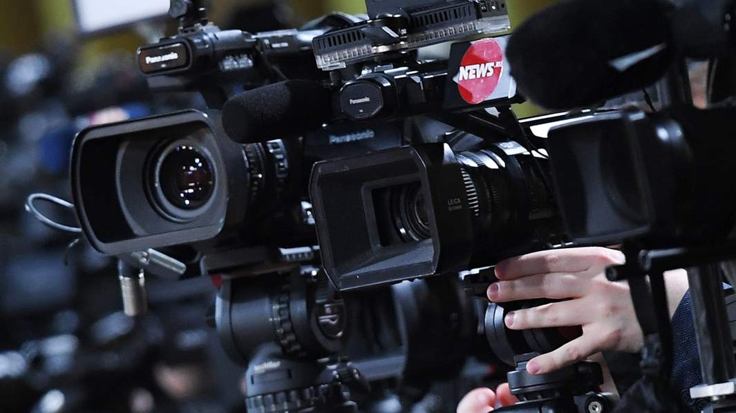 журналисты камеры