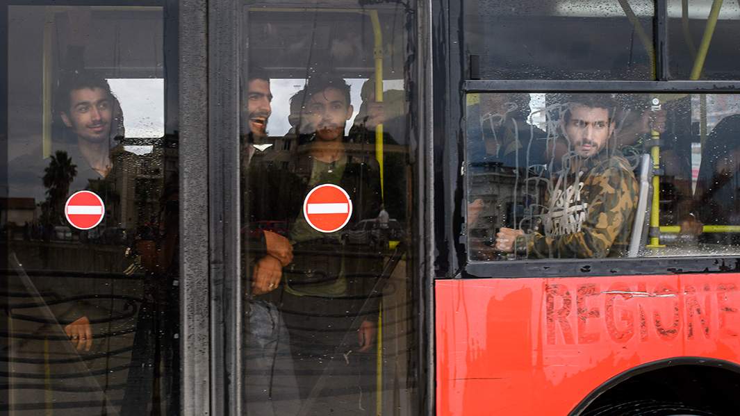 Мигранты в Италии