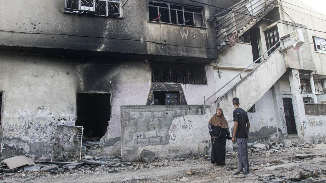 Вид на разрушенный дом в лагере беженцев Дженин недалеко от города Дженин на севере Западного берега, Палестина