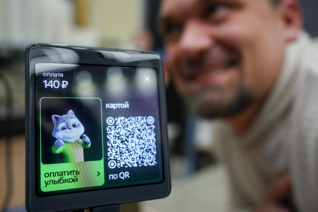 Оплата улыбкой