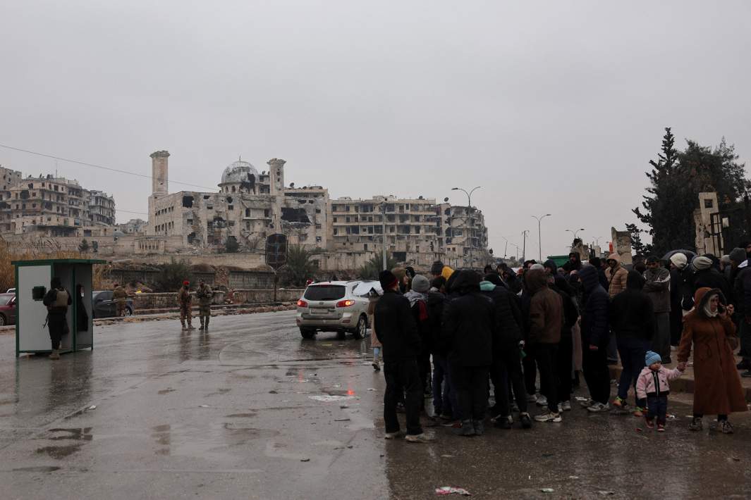 Люди на улице Алеппо 