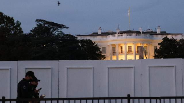 US Secret Service officers on the square in front of the White House in Washington