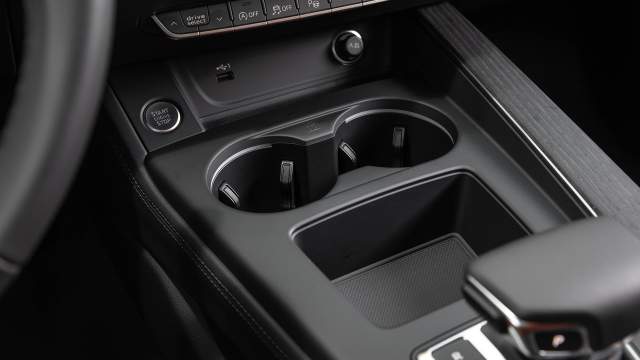 Вместо шайбы MMI — ниша для мелочевки