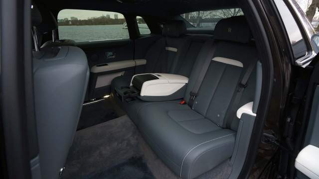 Rear seats with a margin.  The sofa, despite the folding armrest, is only intended for two passengers
