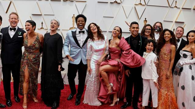 Cast of Encanto pose on the red carpet during the Oscars arrivals at the 94th Academy Awards in Hollywood