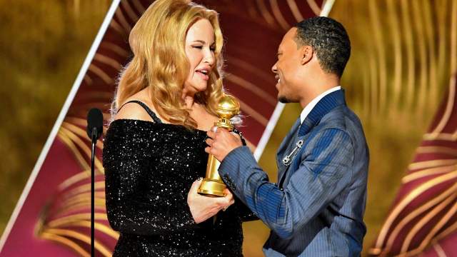 Jennifer Coolidge and Best Supporting Actor in a TV Series, Tyler James Williams, Abbott Elementary are seen on stage at the 80th Annual Golden Globe Awards® at the Beverly Hilton