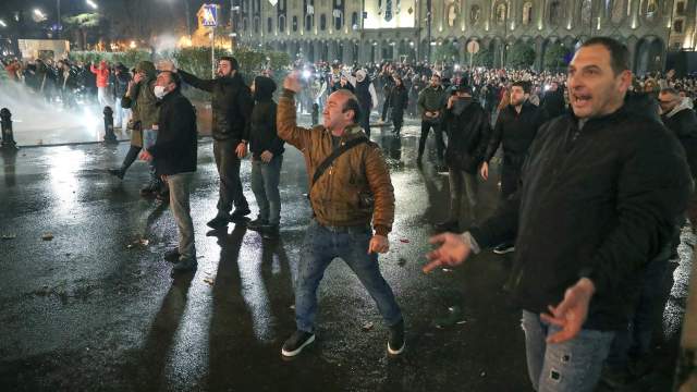 Police use a water cannon to disperse protesters, who hold a rally against the "foreign agents" law in Tbilisi, Georgia, March 7
