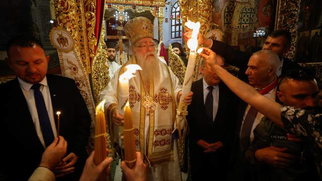 Metropolitan Vindictus, Patriarchal Representative for the Greek Orthodox in Bethlehem leads the celebration as the Holy Fire arrives to the Church of Nativity in Bethlehem in the Israeli