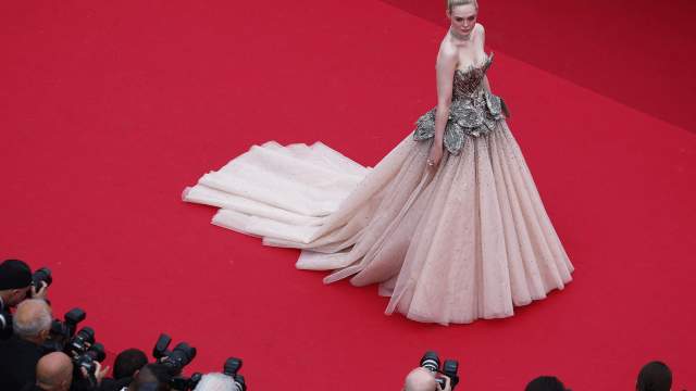 The 76th Cannes Film Festival - Opening ceremony and screening of the film "Jeanne du Barry" Out of competition - Red Carpet arrivals - Cannes, France, May 16, 2023. Elle Fanning poses