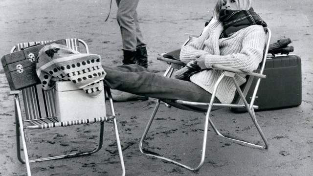  Dec. 16, 1978 - Bardot on the beach Brigitte keeps warm while waiting for filming to start