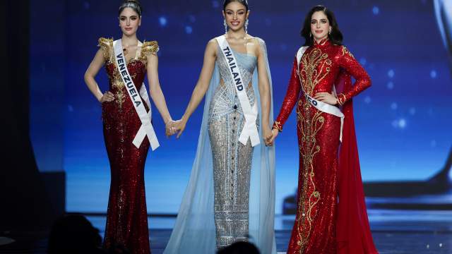 The top three contestants, Stephany Abasali of Venezuela, Praveenar Singh of Thailand, and Fatima Bosch of Mexico hold their hands during the 74th Miss Universe pageant in Bangkok, Thailand, November 21, 2025