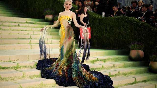 Emma Chamberlain poses during the Met Gala, an annual fundraising gala held for the benefit of the Metropolitan Museum of Art's Costume Institute with this year's theme 'Costume Art' in New York City, New York, U.S., May 4, 2026