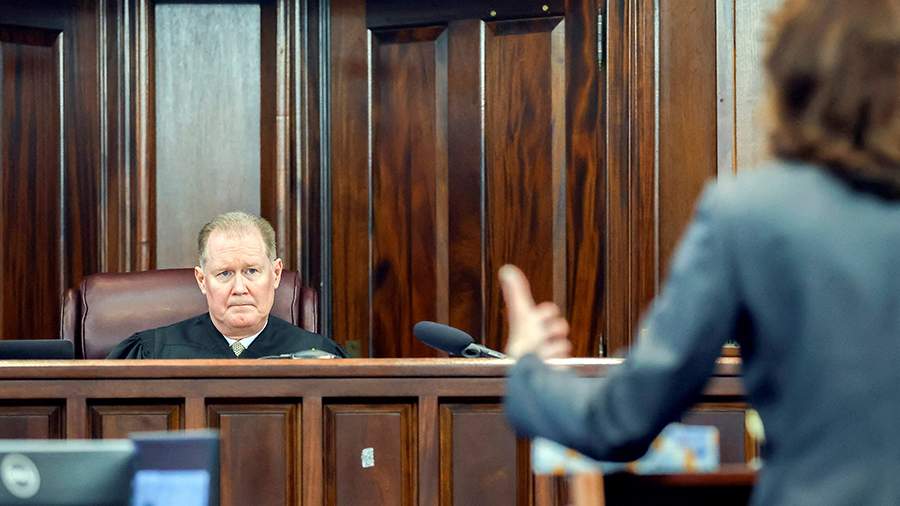 In the United States, three men were sentenced to life in prison for the murder of a black man