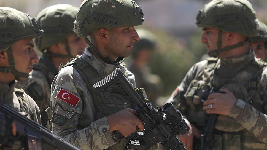 Three Turkish military killed in explosion on border with Syria