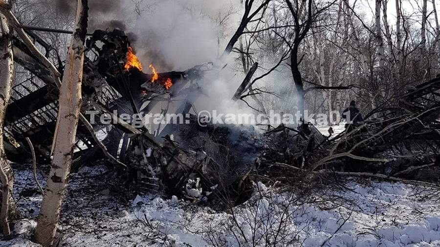 Firefighters put out the fire at the An-2 crash site