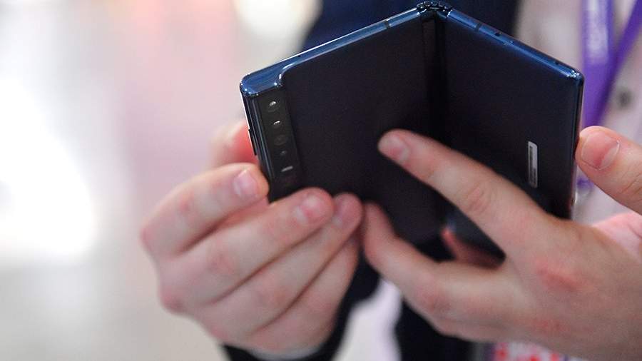 Смартфон в руке