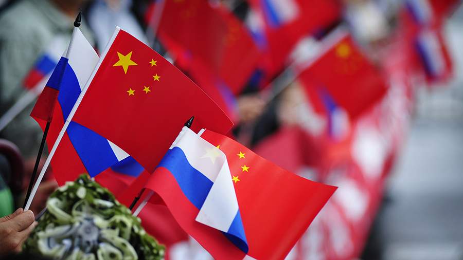 China pledges to protect its companies from US sanctions over ties to Russian Federation