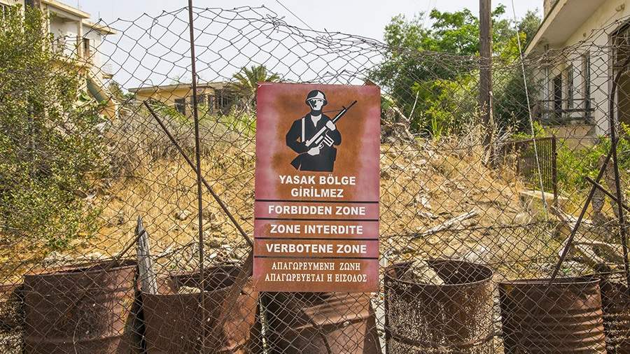 Warning sign on the fence of the closed part of Varosha