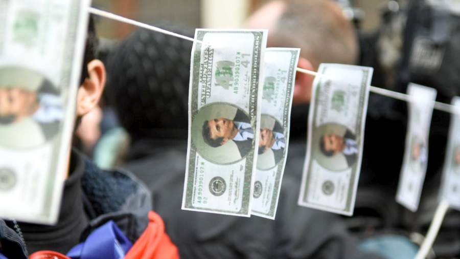 Opposition protesters hung up banknotes depicting the chairman and founder of the ruling party in Georgia "Georgian dream" Bidzina Ivanishvili