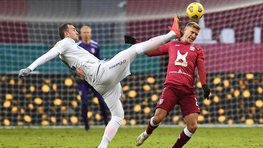 FC Zenit player Artyom Dzyuba and FC Rubin player Karl Starfelt in the match of the 21st round of the Russian Football Championship among Premier League clubs between the teams of FC Rubin and FC Zenit