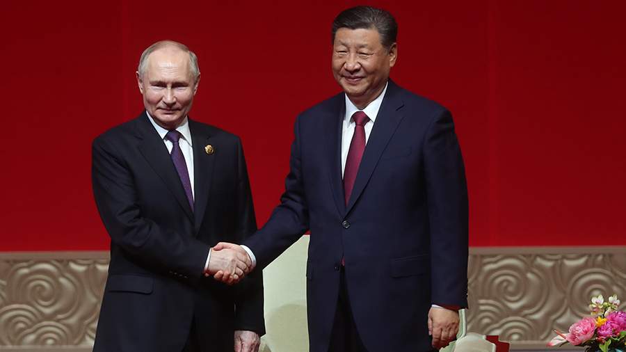 События недели в фотографиях: визит Путина в Китай, покушение на Фицо, протесты в Грузии