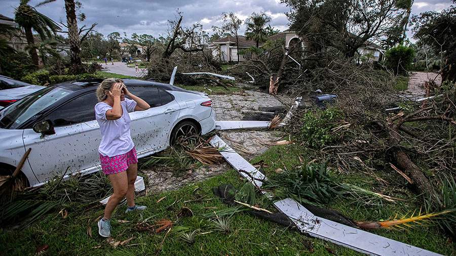 События недели в фотографиях: новый чемпион по боксу, смертоносные стихии и праздник в Индии