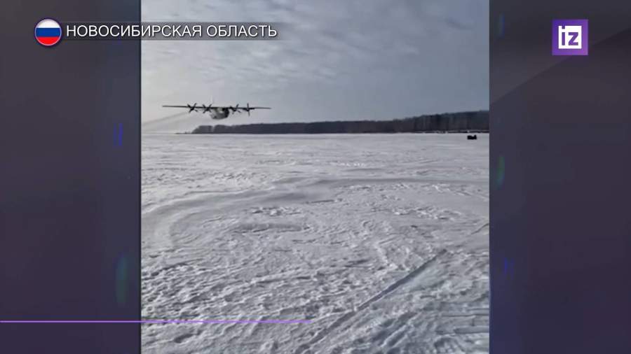 Самолет Ан-12 пролетел в нескольких метрах над замерзшим водохранилищем