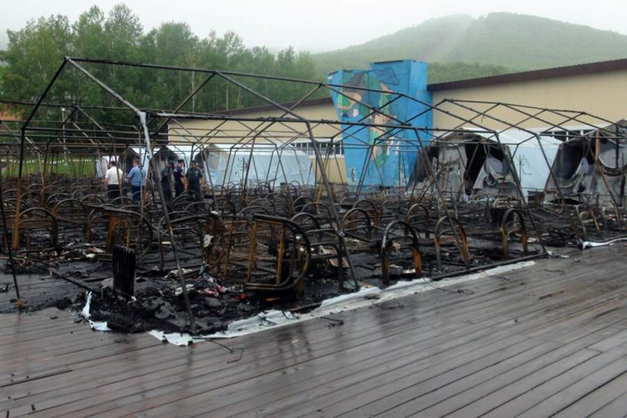 Последствия пожара в палаточном городке