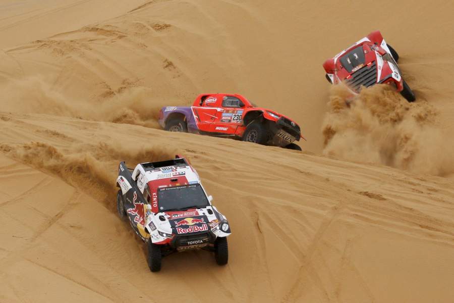Rallying - Dakar Rally - Stage 8 - Al Duwadimi to Riyadh - Saudi Arabia - January 8, 2023 Overdrive Racing's Lucas Moraes and Co-Driver Timo Gottschalk and Toyota Gazoo Racing's Nasser Al-Attiyah and Co-Driver Mathiu Baumel in action during Stage 8