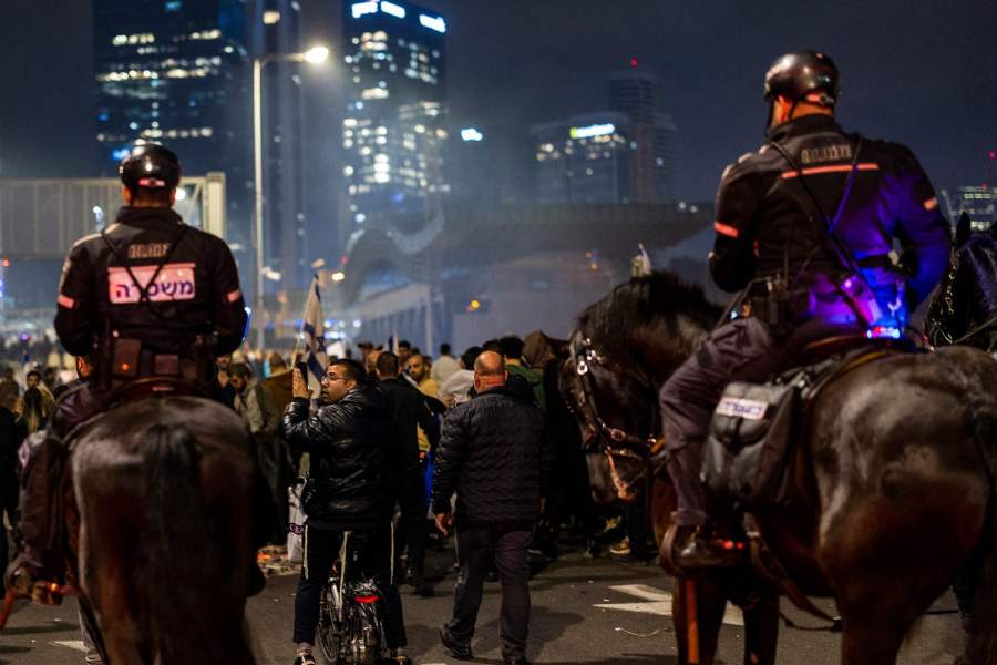Tel Aviv: Israeli mounted police disperse anti-government protesters who took to the streets, following Netanyahu's dismissal of Defence Minister Galant. Angry protests broke out in�Tel Aviv on Sunday night following Israeli Prime Minister Benjamin Netanyahu's dismissal of Defence Minister Yoav Galant which came after he called on the government to halt its controversial judicial reform