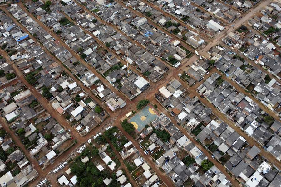 Streets are flooded by rain in the Sol Nascente favela of Brasilia, Brazil, Monday