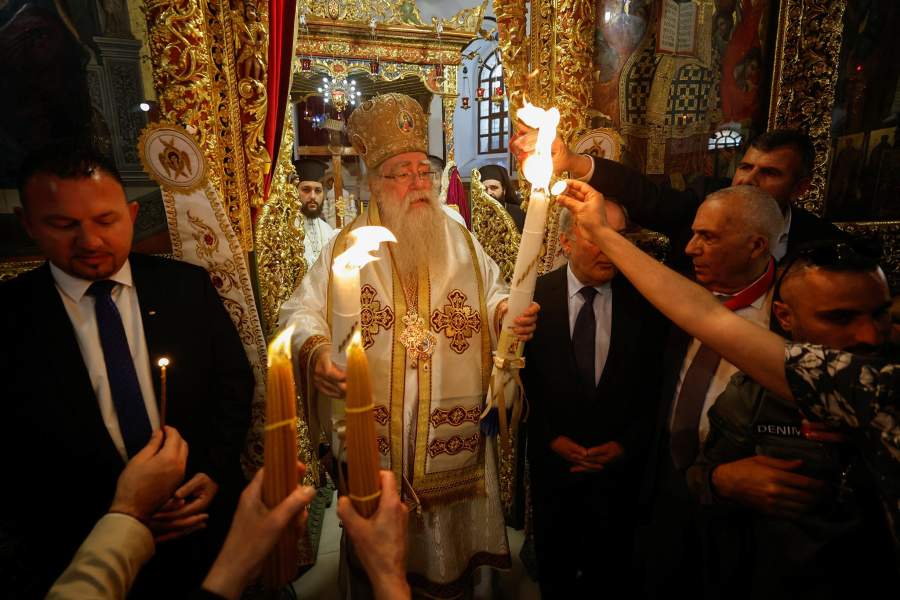 Metropolitan Vindictus, Patriarchal Representative for the Greek Orthodox in Bethlehem leads the celebration as the Holy Fire arrives to the Church of Nativity in Bethlehem in the Israeli