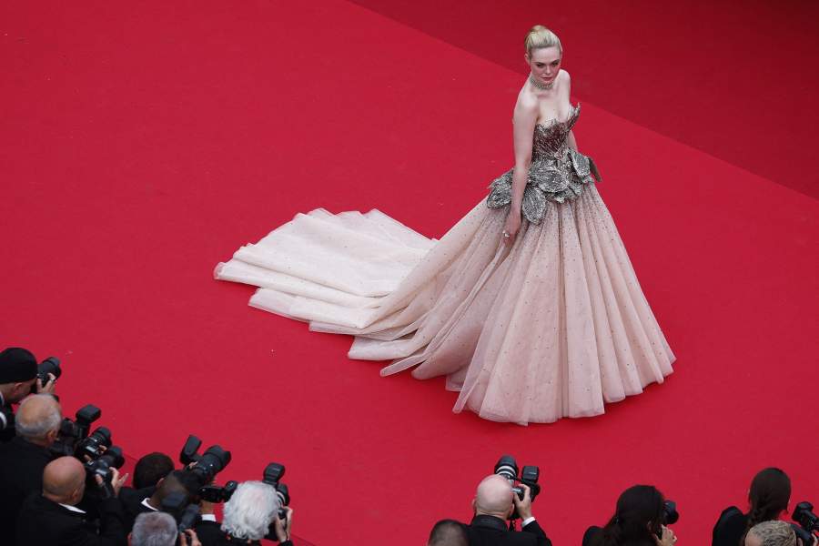 The 76th Cannes Film Festival - Opening ceremony and screening of the film "Jeanne du Barry" Out of competition - Red Carpet arrivals - Cannes, France, May 16, 2023. Elle Fanning poses