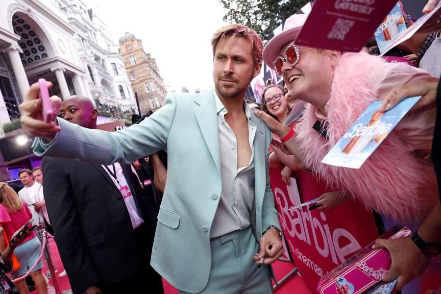 Warner Bros. Pictures Presents The European Premiere Of "Barbie" - Roaming LONDON, ENGLAND - JULY 12: Ryan Gosling takes a selfie with fans during The European Premiere Of "Barbie" at Cineworld Leicester Square on July 12, 2023 in London, England. (Photo by Tristan Fewings/Getty Images for Warner Bros.)