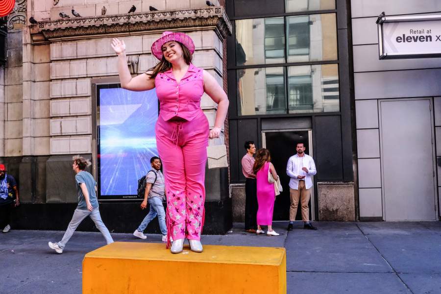 NEW YORK, NEW YORK - JULY 21: People dress up as the doll Barbie to attend the Barbie movie on July 21, 2023 in New York City. On the opening day, director Greta Gerwig's film "Barbie" sparked a Barbie-mania among fans who flocked to the theaters wearing their favorite Barbie-inspired attire. (Photo by Stephanie Keith/Getty Images)