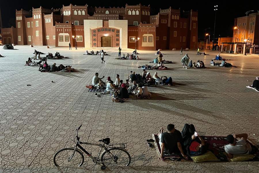 This photo taken with a mobile phone shows residents taking shelter at an open space after an earthquake in Ouarzazate, Morocco, Sept. 9, 2023. At least 30 people have been killed in a strong earthquake that jolted Morocco on Friday night, local media reported, adding that the death toll is expected to increase. 